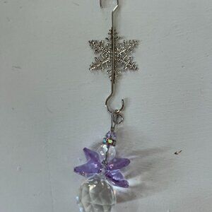 Angel with purple wings Suncatcher on Snowflake holder